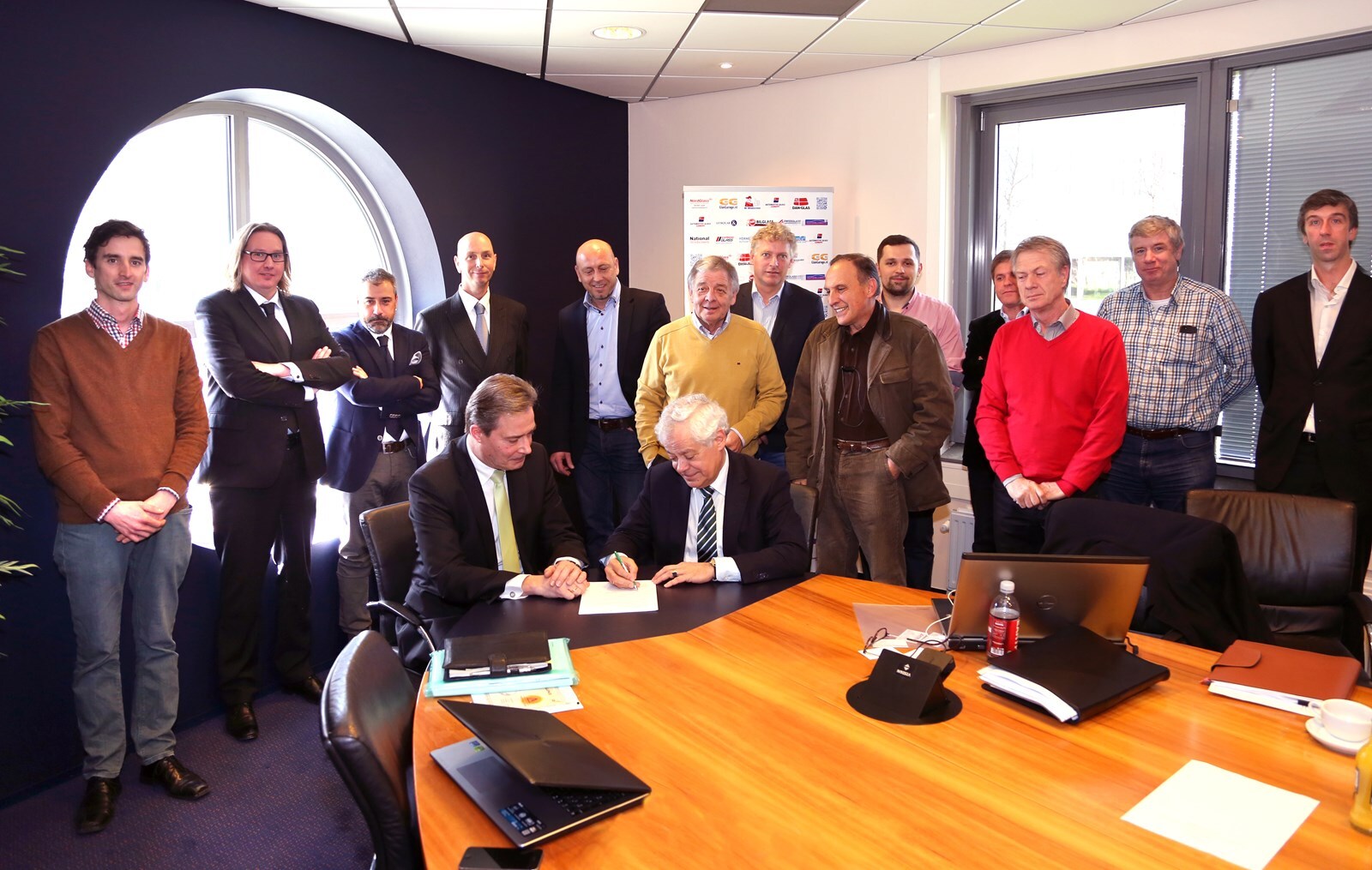 AutomotiveGlassEurope and DEKRA Certification signing co-operation contract (photo: Kijklens)
